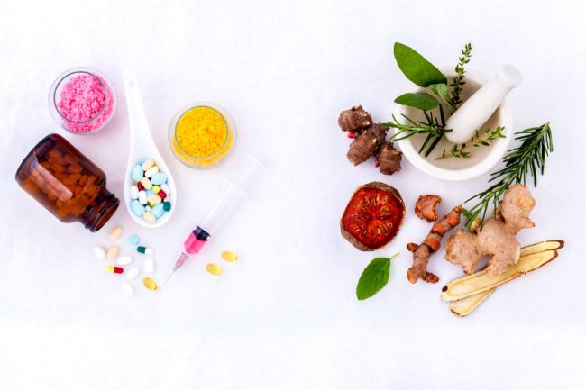 herbal medicine vs chemical medicine the alternative healthy care on white background.