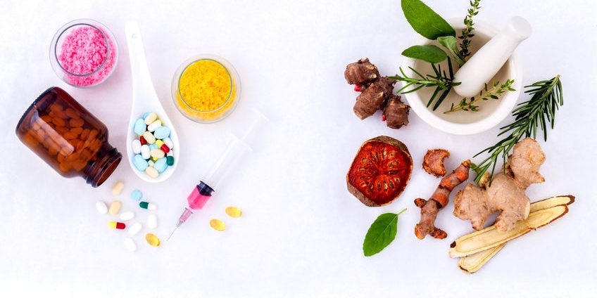 herbal medicine vs chemical medicine the alternative healthy care on white background.