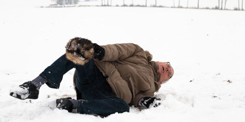 17546735 – senior man with injured leg falling on snow. senior man with injured leg falling on snow.