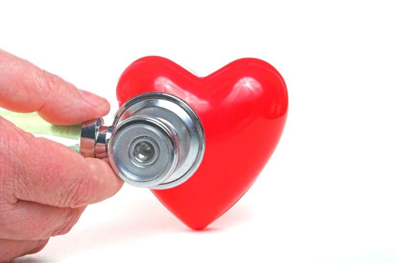 a red heart shape and a medical stethoscope.